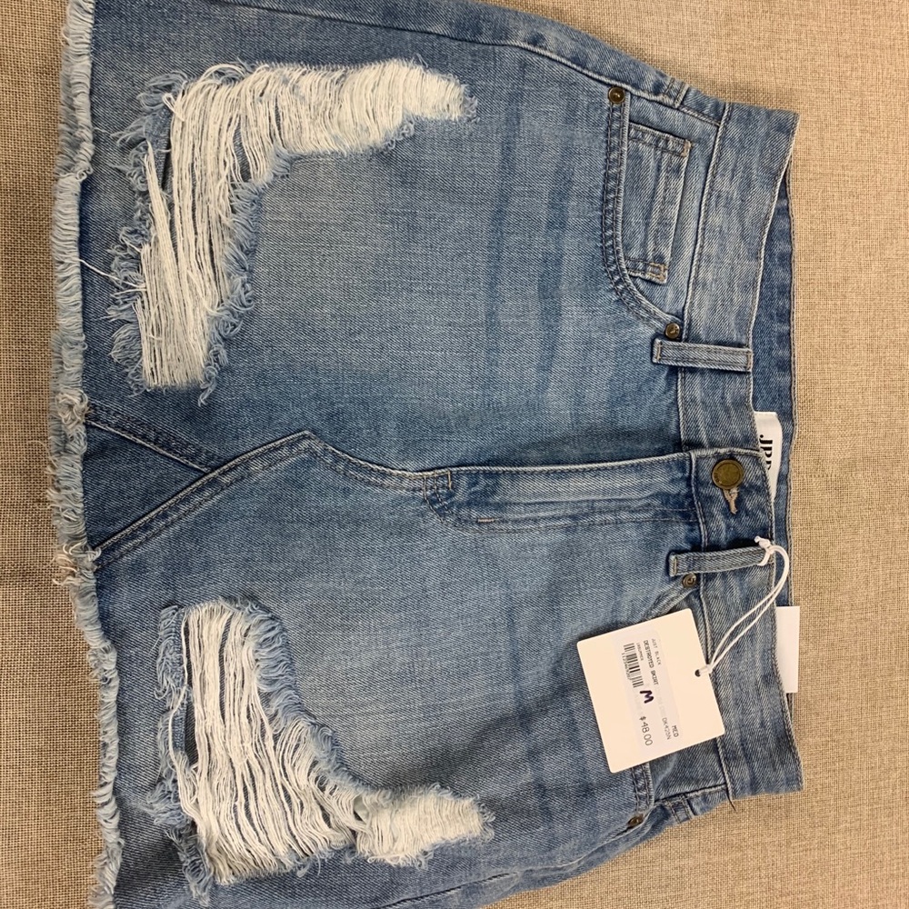 Distressed denim skirt